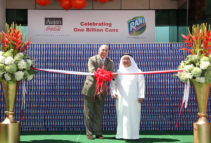 Sheikh Adel Aujan, Chairman, Aujan Group Holding, and Muhtar Kent, Chairman and CEO, The Coca-Cola Company, celebrate the 1 billionth can of Rani produced under their partnership which was created in 2012. 