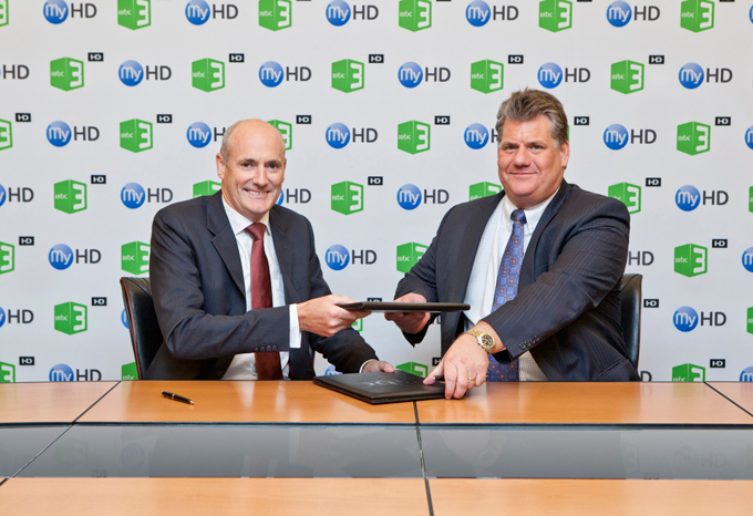 Sam Barnett, CEO MBG Group and Cliff Nelson,CEO My-HD signing the agreement