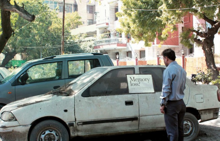 Memory Loss? Abandoned cars turned into ads!