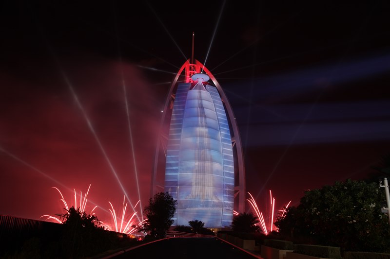 Image of the Burj Khalifa projected onto the Burj Al Arab, Dubai in UAE’s 42nd National Day celebrations